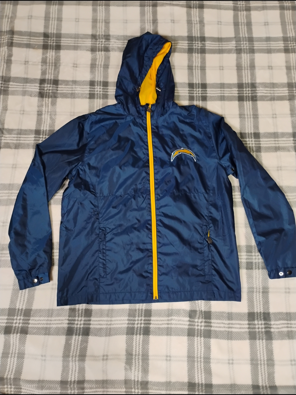 NFL Black Jacket with Red and Blue Shield Logo